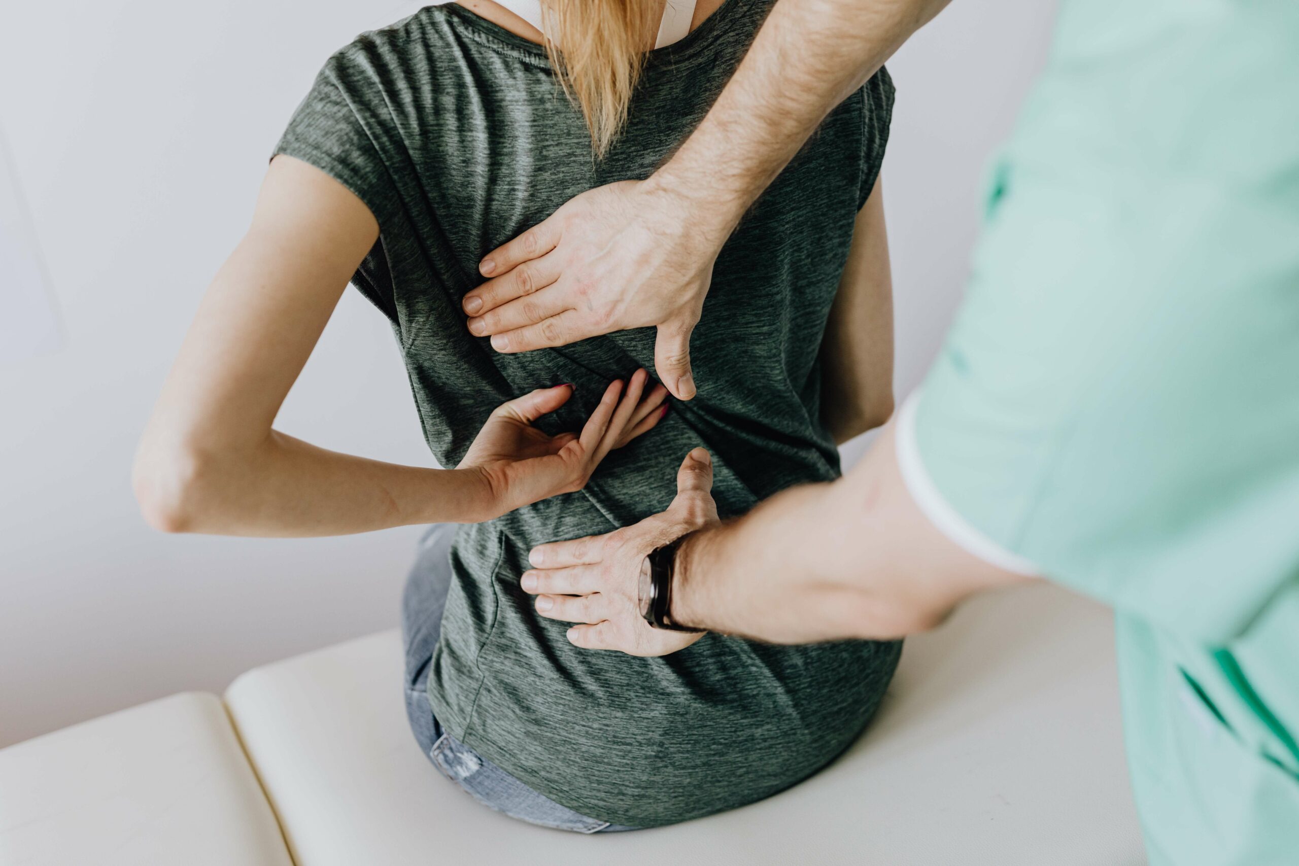 A pelvic floor physical therapist examines a woman who is dealing with painful bladder syndrome in Washington, DC.